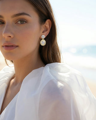 Worn image of Éclora earrings, entirely paved with diamonds